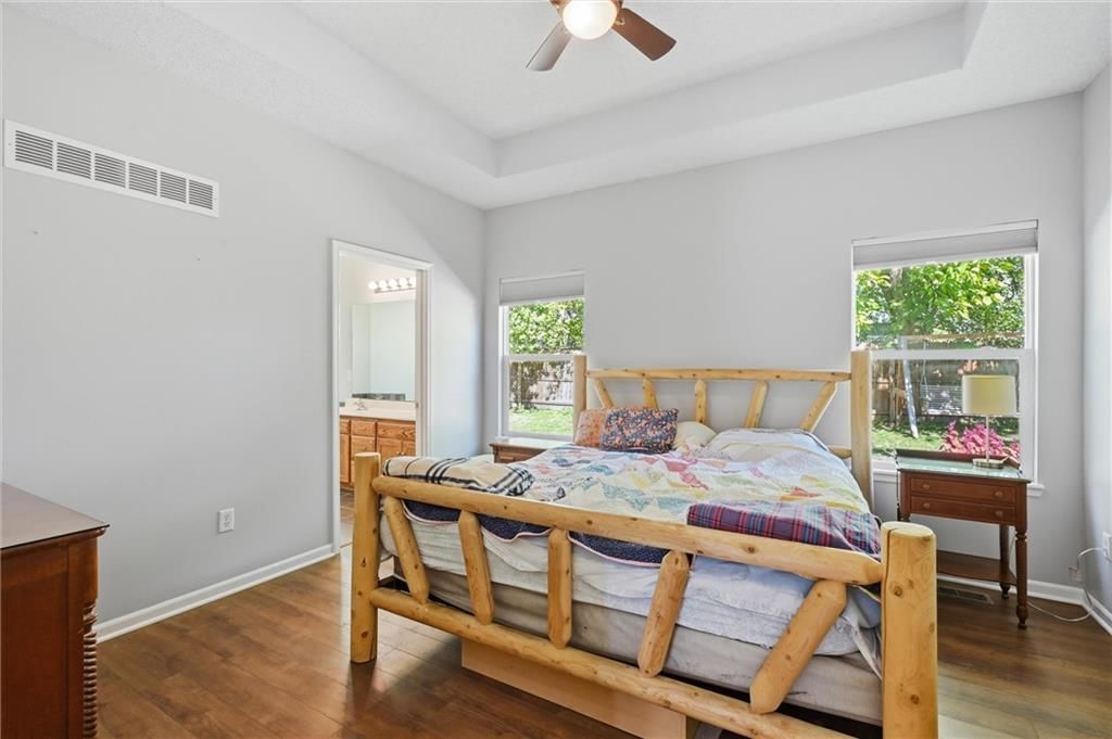 Main-floor primary bedroom at 20426 W 220th Terrace, Spring Hill, KS 66083
