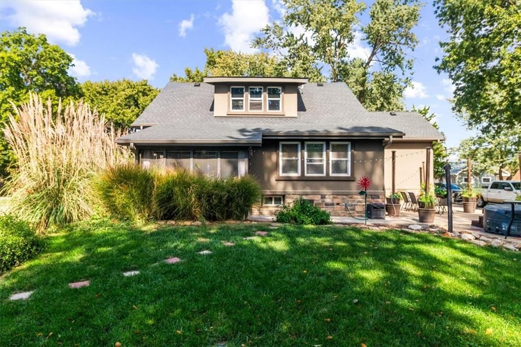 Hot tub, covered patio and concrete patio at 1608 Smith Street, Blue Springs, MO 64015