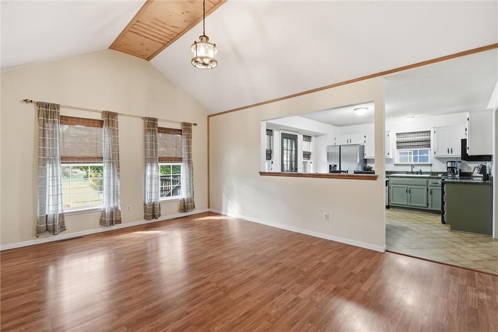 Open floor plan and white trim at 1302 Deena Street, Pleasant Hill, MO 64080