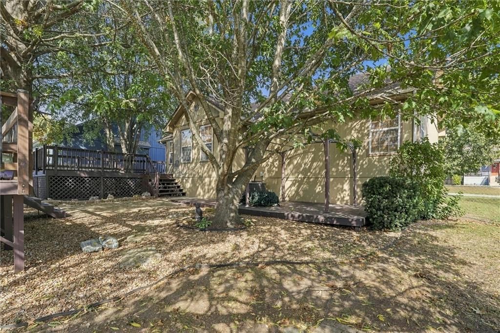 In-ground pool, big backyard and fenced yard at 1302 Deena Street, Pleasant Hill, MO 64080
