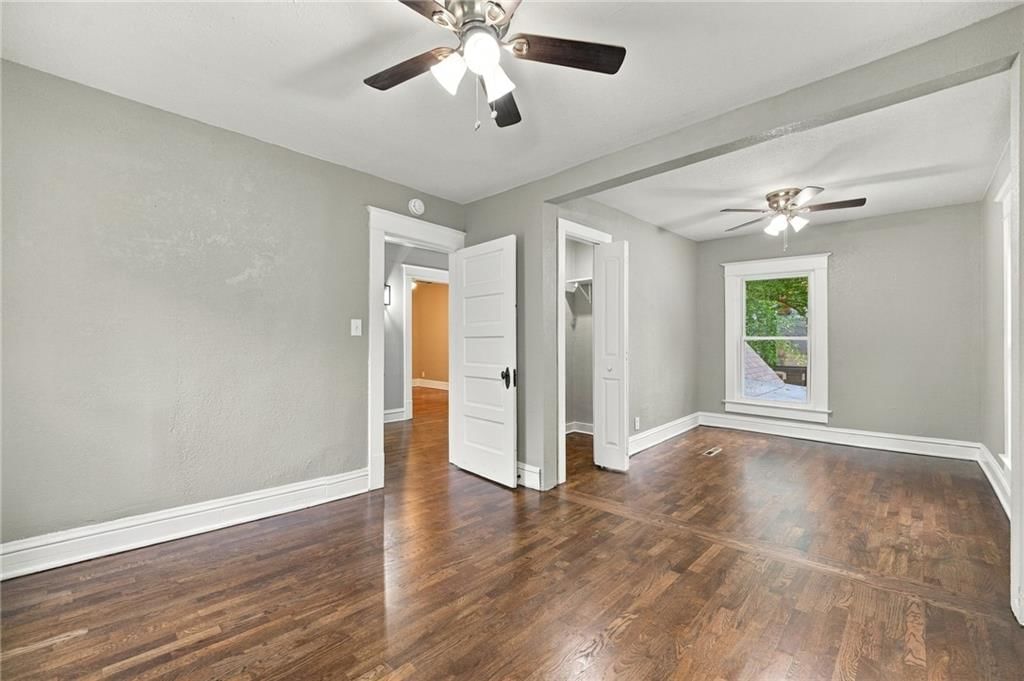 Tiled shower, frameless glass shower and renovated bathrooms at 720 W 7th Street, Leavenworth, KS 66048