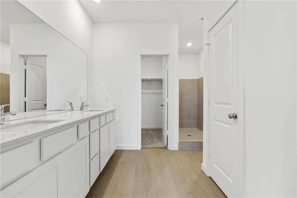 Double vanity and white vanity at 4004 NE Apple Grove Drive, Lee's Summit, MO 64064