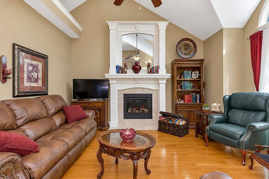 Tall ceilings, fireplace and plaster fireplace at 993 Sicklebar Drive, Peculiar, MO 64078