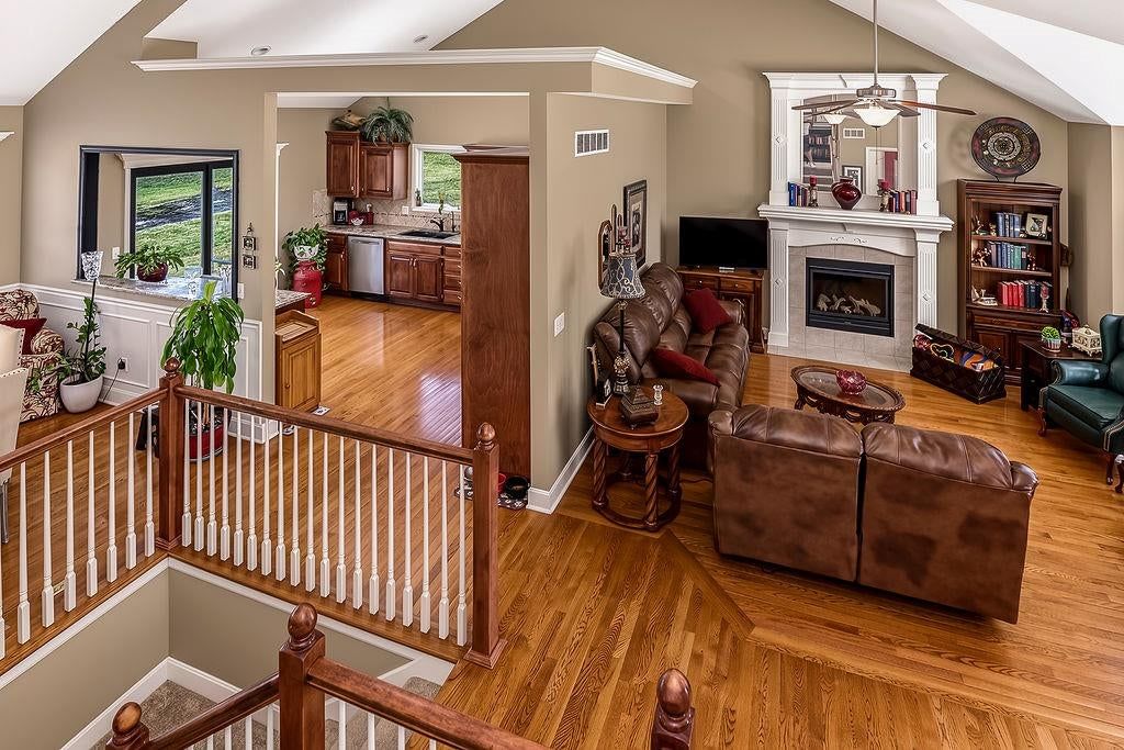 Open floor plan at 993 Sicklebar Drive, Peculiar, MO 64078