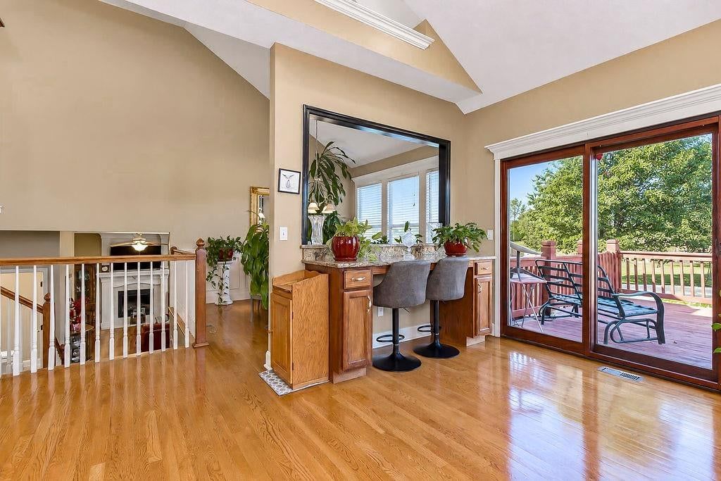 Deck and breakfast nook at 993 Sicklebar Drive, Peculiar, MO 64078