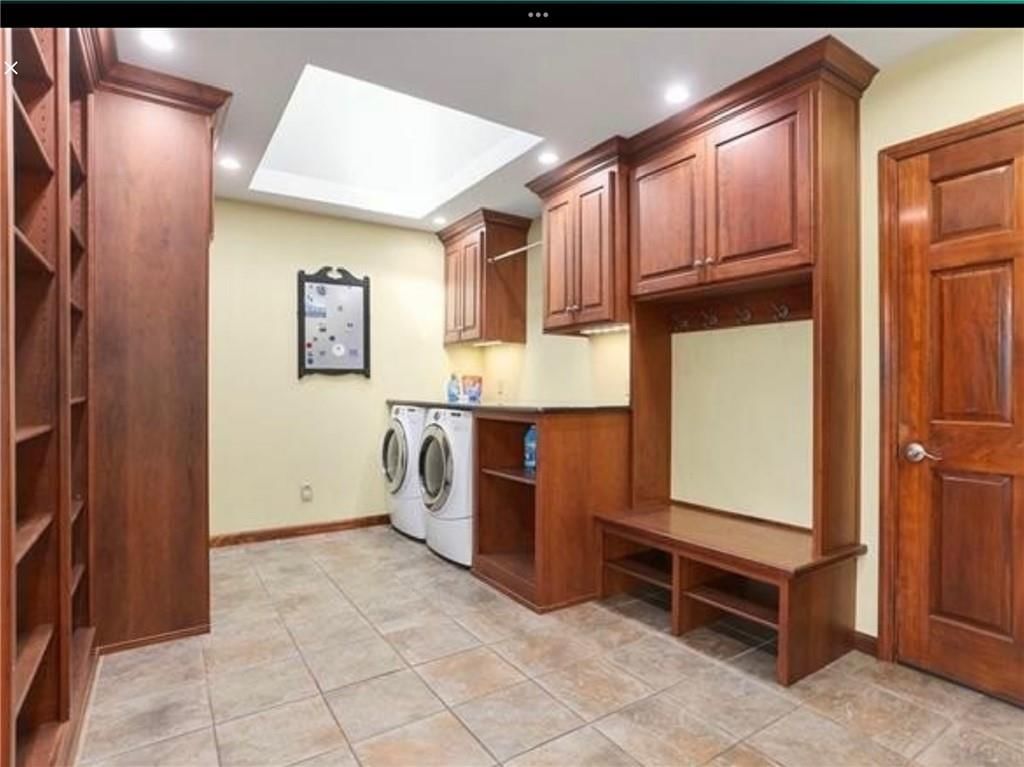 Tile floors at 7955 NW Bridle Parc Lane, Kansas City, MO 64152