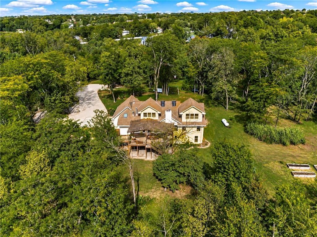 Big backyard and mature trees at 7955 NW Bridle Parc Lane, Kansas City, MO 64152