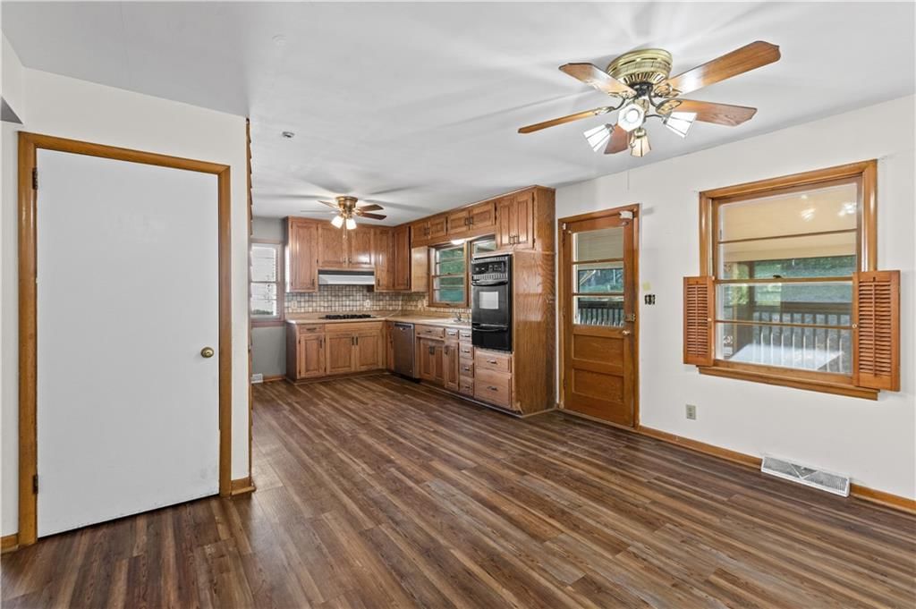 Open floor plan and breakfast nook at 413 Maple Street, Liberty, MO 64068