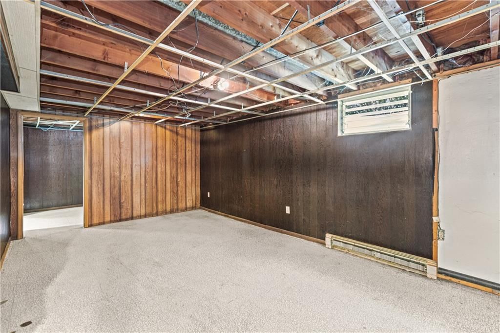 Garage storage system and staircase at 413 Maple Street, Liberty, MO 64068