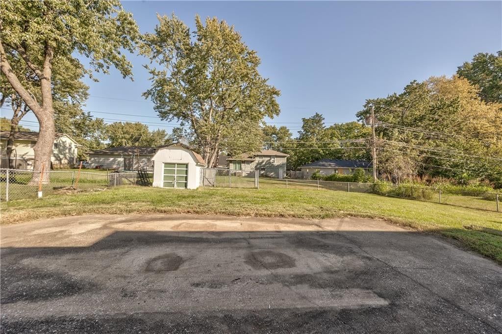 Big backyard and fenced yard at 8006 E 89th Street, Kansas City, MO 64138