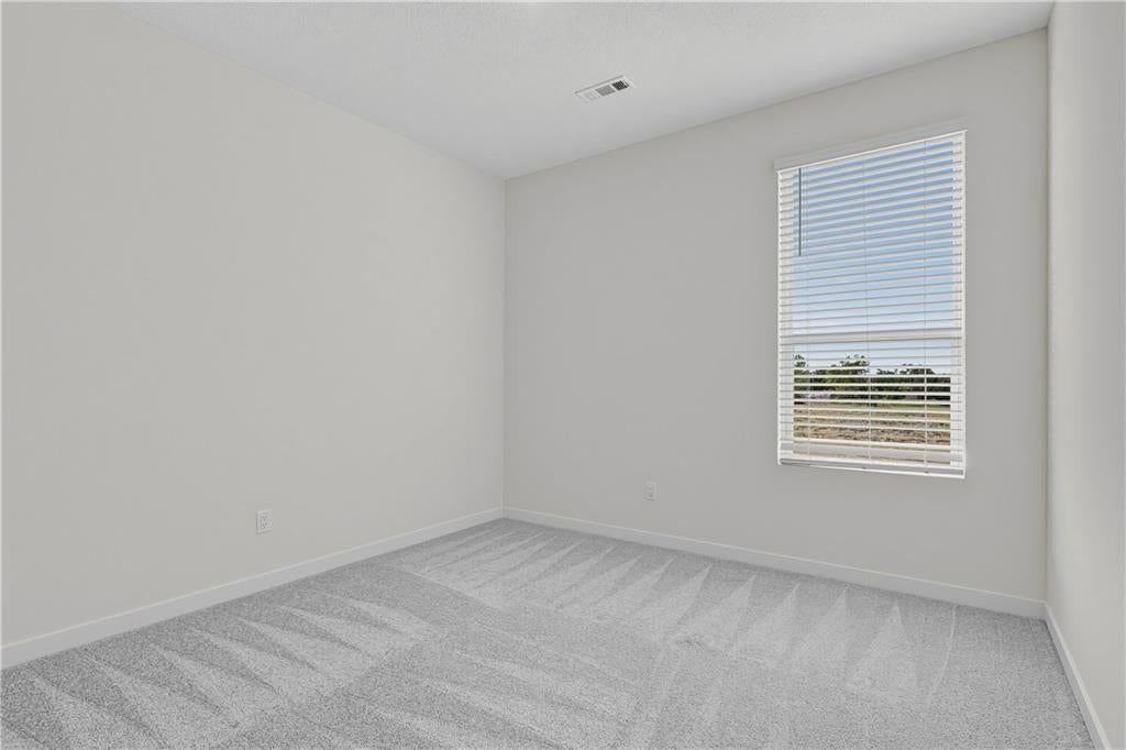 Photo 10 of 14 - 4108 NE Apple Grove Drive, Lee's Summit, MO 64064