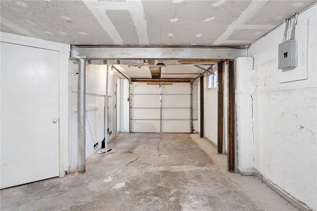 Staircase and attached garage at 2316 Blue Ridge Terrace, Independence, MO 64052