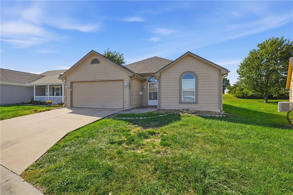 Photo 2 of 26 - 502 S Saturn Drive, Raymore, MO 64083