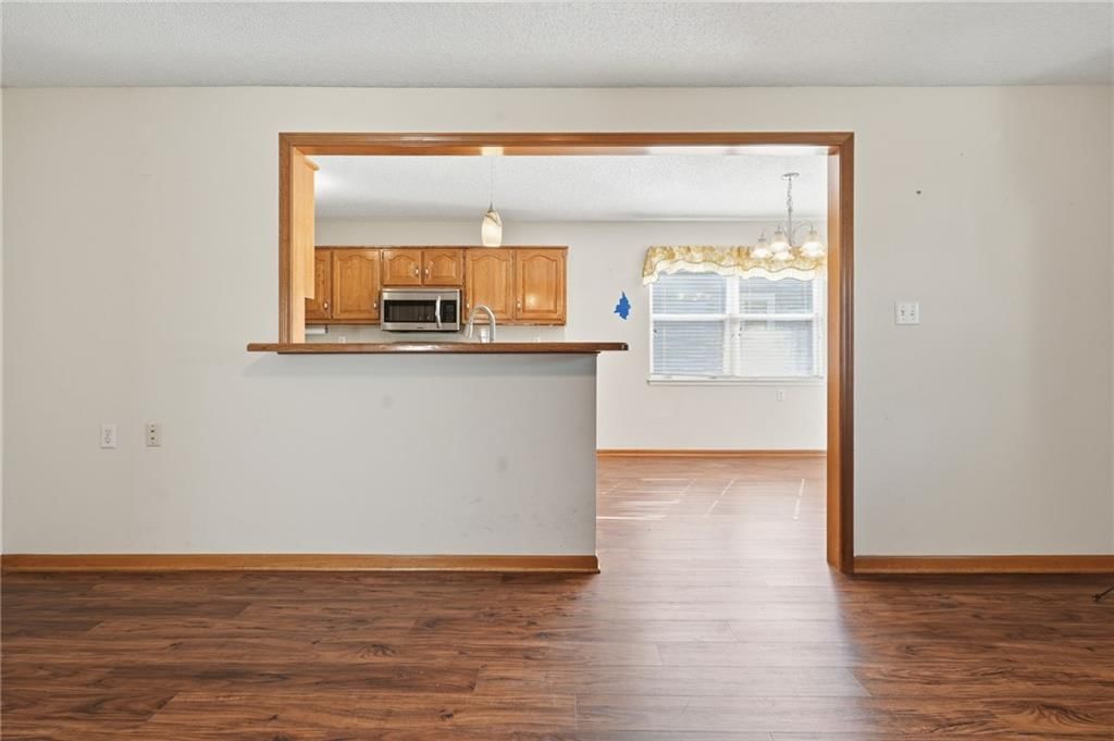 Open floor plan at 502 S Saturn Drive, Raymore, MO 64083