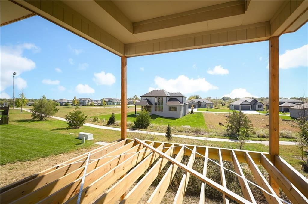 Covered patio at 905 Savannah Lane, Greenwood, MO 64034