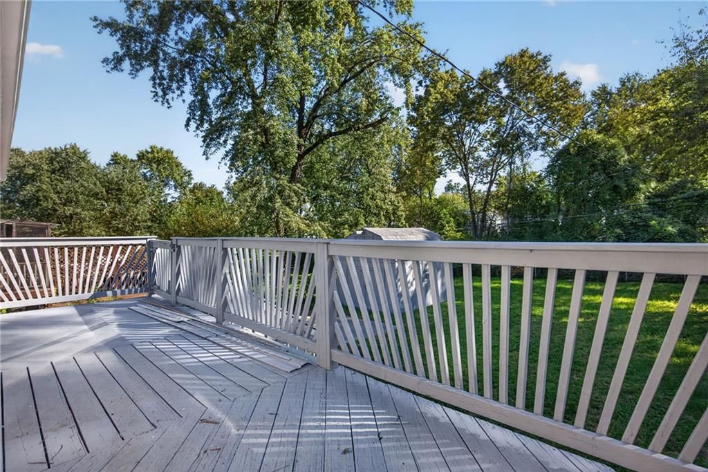 Deck and mature trees at 4909 N Manchester Avenue, Kansas City, MO 64119