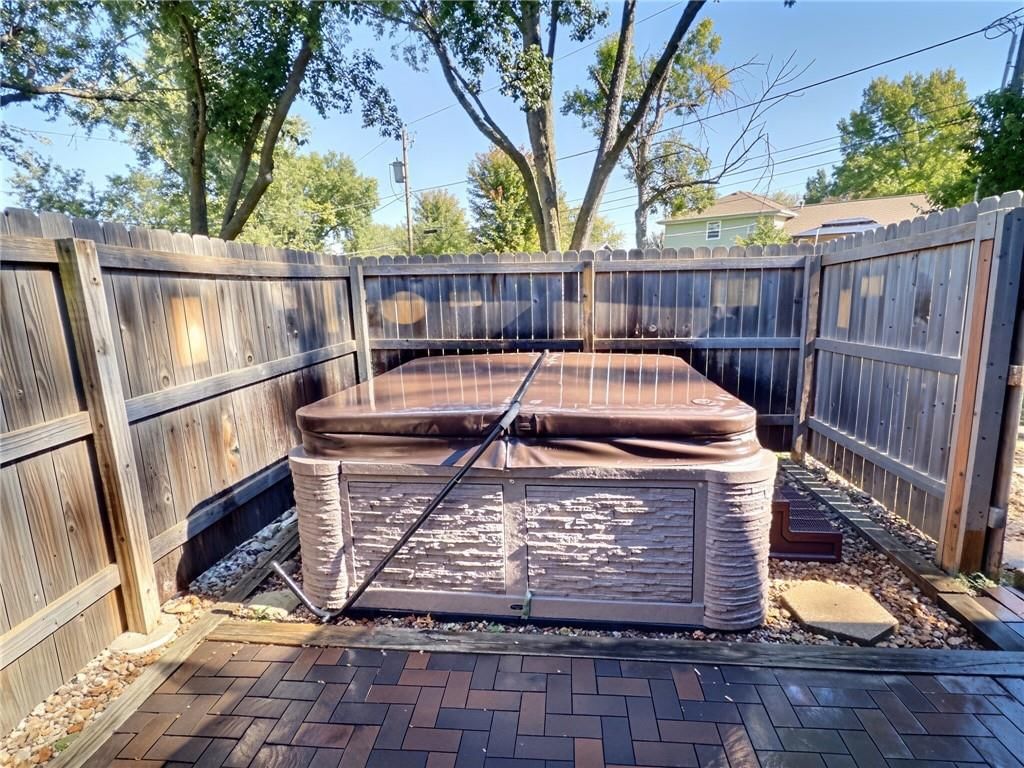 Big backyard, mature trees and flat lot at 8809 Widmer Road, Lenexa, KS 66215