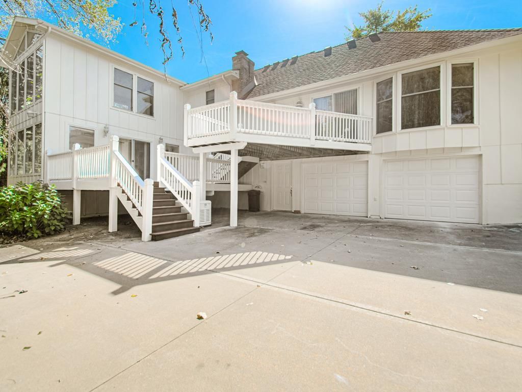Attached garage, concrete driveway and concrete patio at 14616 E 43rd Street S, Independence, MO 64055
