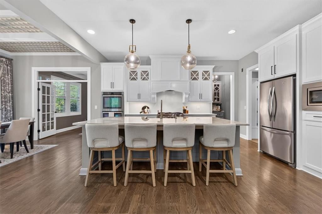 Photo 16: white kitchen cabinets, 5008 W 141st Terrace, Leawood, KS 66224