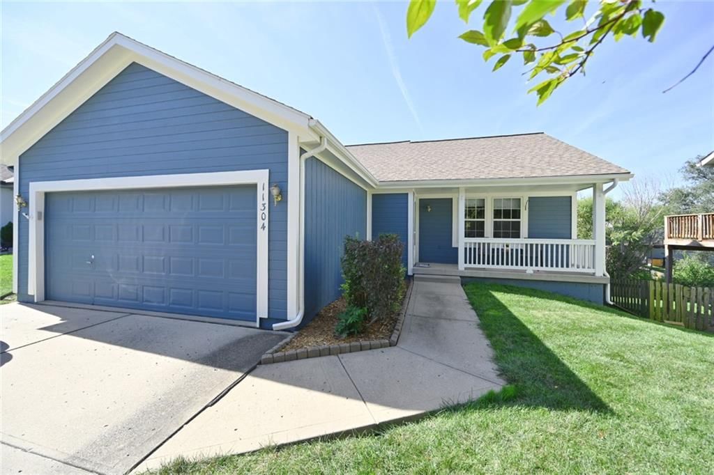 Attached garage at 11304 N NASHUA Drive, Kansas City, MO 64155