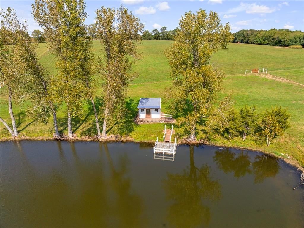 Pond or creek visible on the lot at 25160 W 223rd Street, Spring Hill, KS 66083