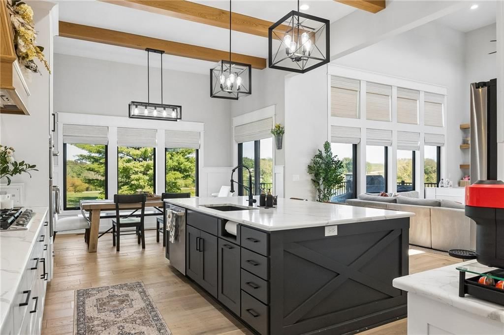 Statement lighting and ceiling beams at 12804 NE 117th Street, Kearney, MO 64060