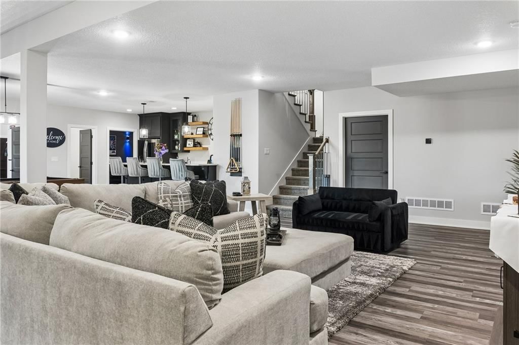 Finished basement, staircase and wood stair railing at 12804 NE 117th Street, Kearney, MO 64060