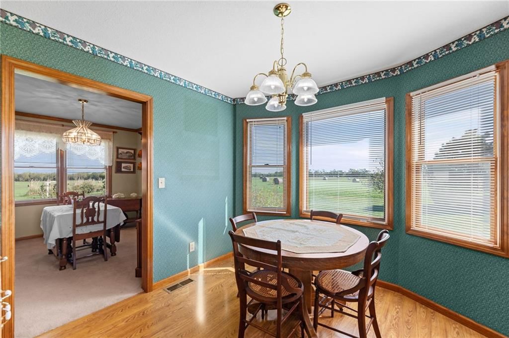 Stainless steel appliances, breakfast nook and electric range at 39824 W 391st Street, Lane, KS 66042