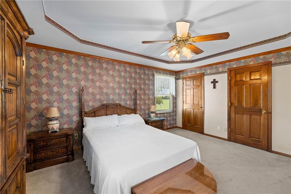 Main-floor primary bedroom at 39824 W 391st Street, Lane, KS 66042