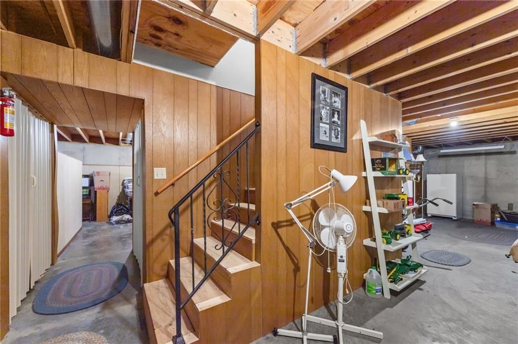 Staircase and iron stair railing at 39824 W 391st Street, Lane, KS 66042