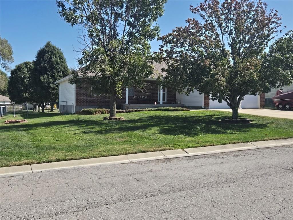 Photo 5 of 43 - 806 Orchid Street, Garden City, MO 64747