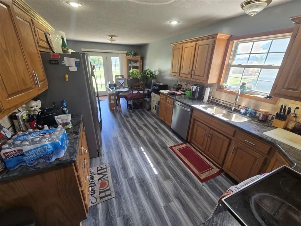 Photo 15 of 43 - 806 Orchid Street, Garden City, MO 64747