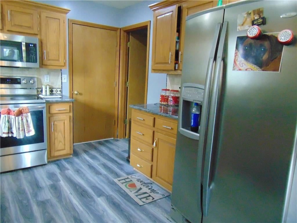 Photo 18 of 43 - 806 Orchid Street, Garden City, MO 64747