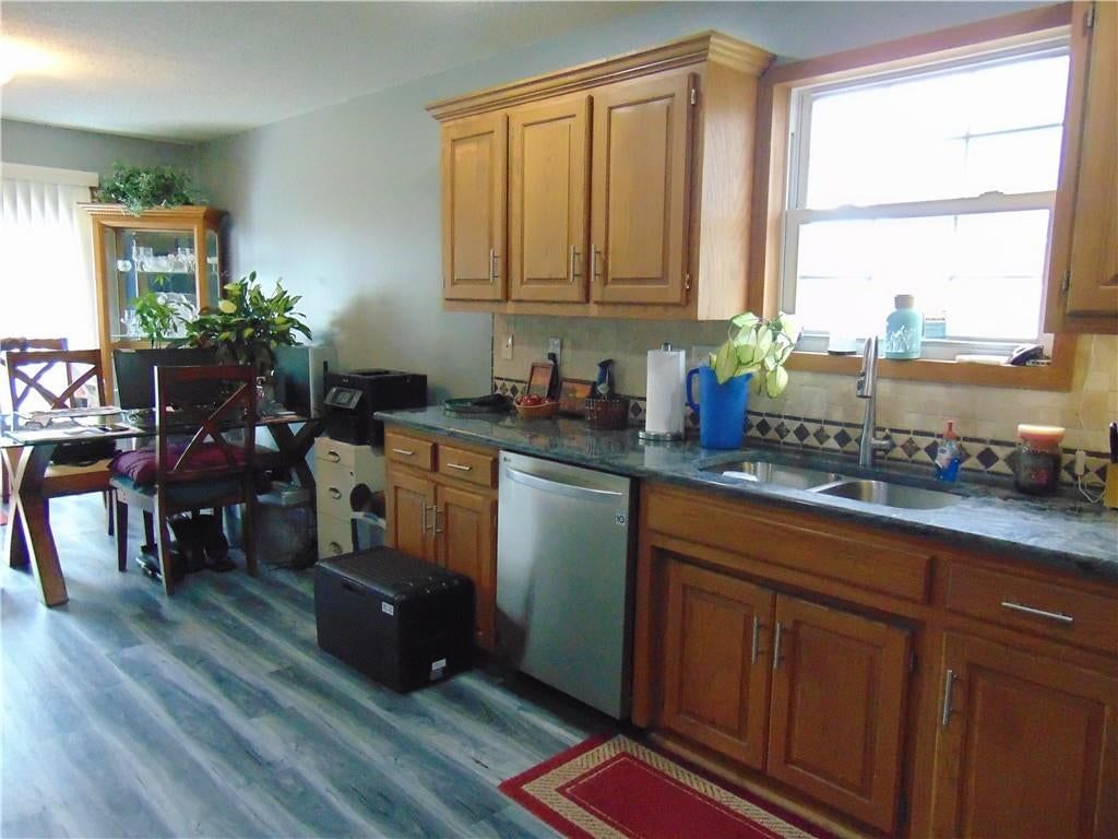 Photo 13 of 43 - 806 Orchid Street, Garden City, MO 64747