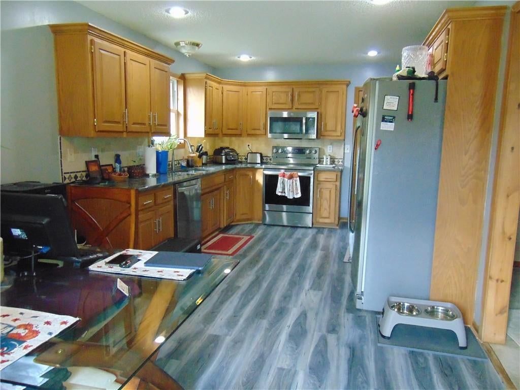Photo 16 of 43 - 806 Orchid Street, Garden City, MO 64747