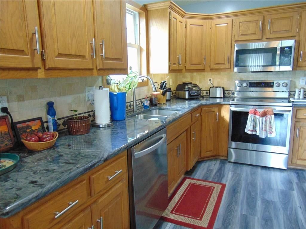 Photo 17 of 43 - 806 Orchid Street, Garden City, MO 64747