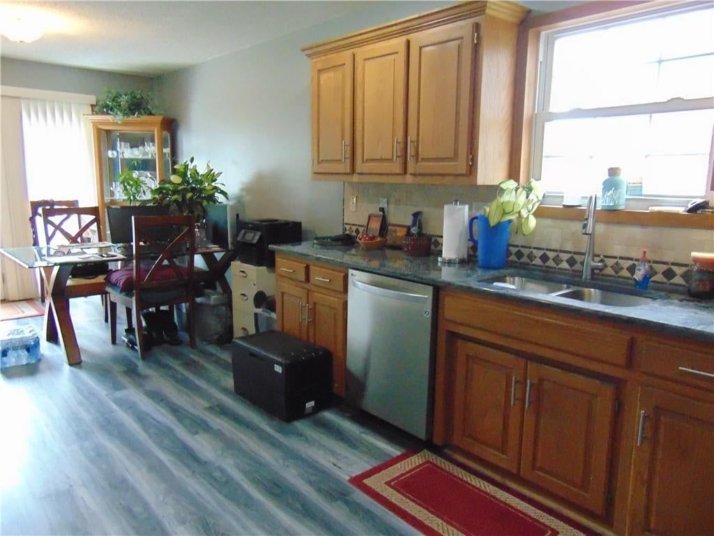 Photo 14 of 43 - 806 Orchid Street, Garden City, MO 64747