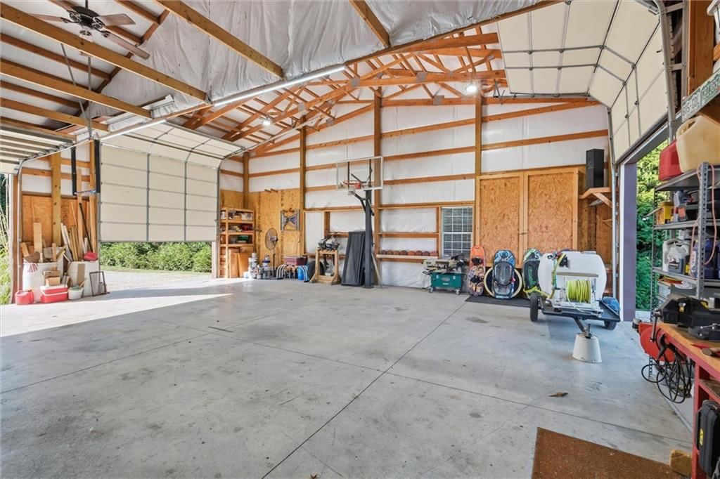 Big backyard, mature trees and flat lot at 27423 New Lancaster Road, Louisburg, KS 66053