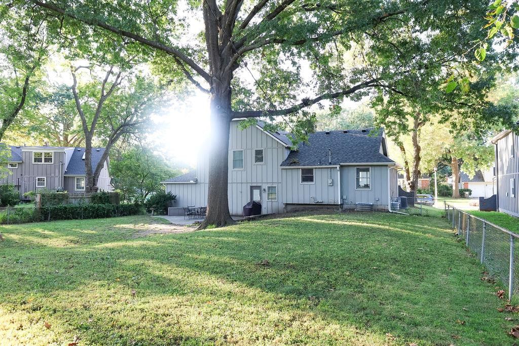 Big backyard, fenced yard and mature trees at 8108 W 96th Terrace, Overland Park, KS 66212