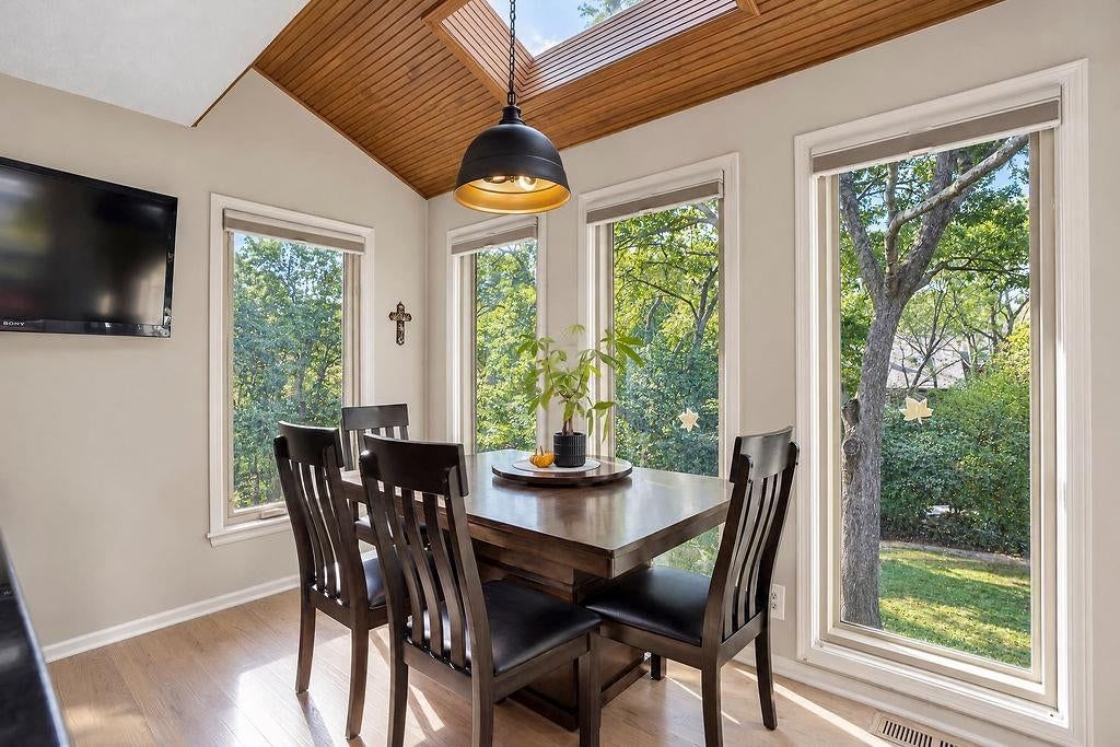 Wall of windows and breakfast nook at 18401 W 114th Terrace, Olathe, KS 66061