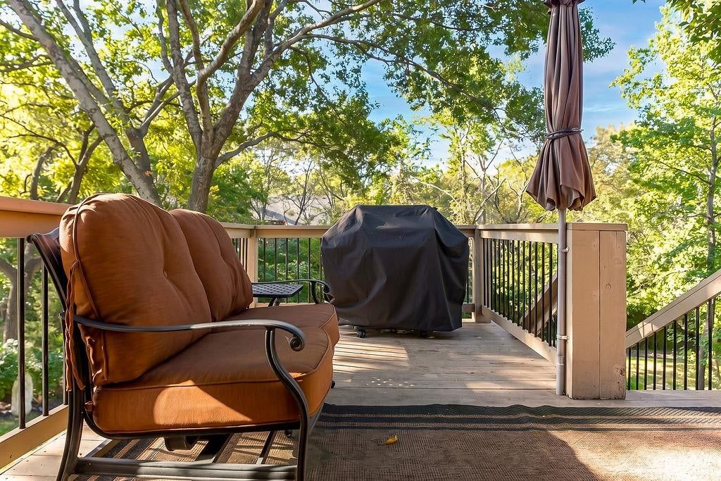 Deck, big backyard and fenced yard at 18401 W 114th Terrace, Olathe, KS 66061