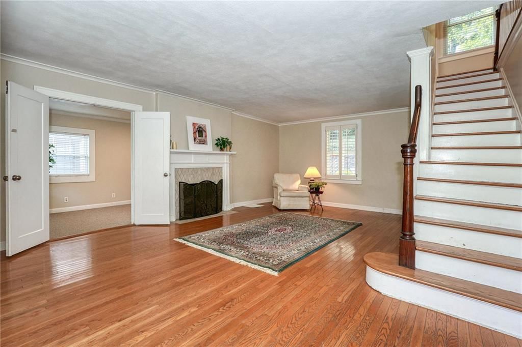 Staircase and wood stair railing at 4900 Westwood Road, Kansas City, MO 64112