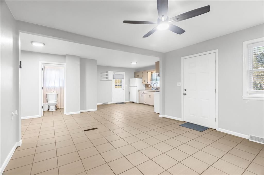 Open floor plan at 1302 S Hedges Avenue, Independence, MO 64052