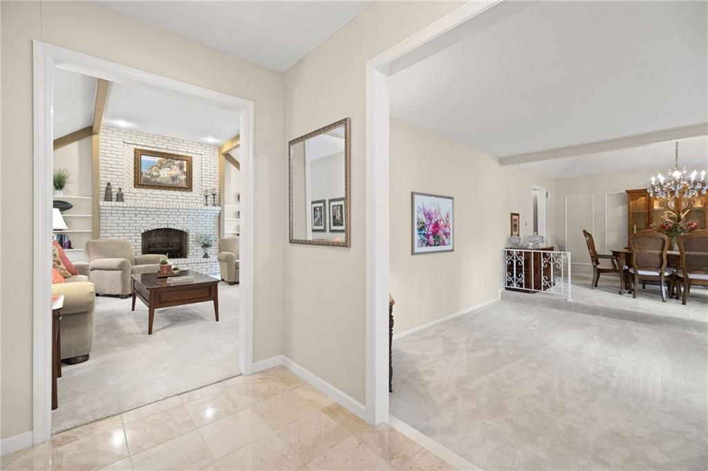 White trim and beige walls at 7812 W 100th Terrace, Overland Park, KS 66212