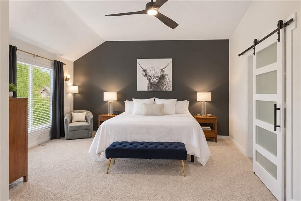 Black hardware, accent wall and carpet at 20831 W 102nd Street, Lenexa, KS 66220
