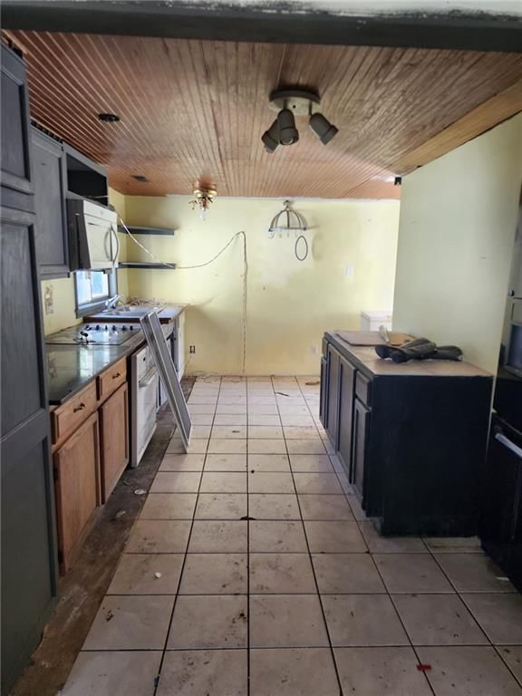 Tile floors at 8202 E Shady Tree Lane, Freeman, MO 64746