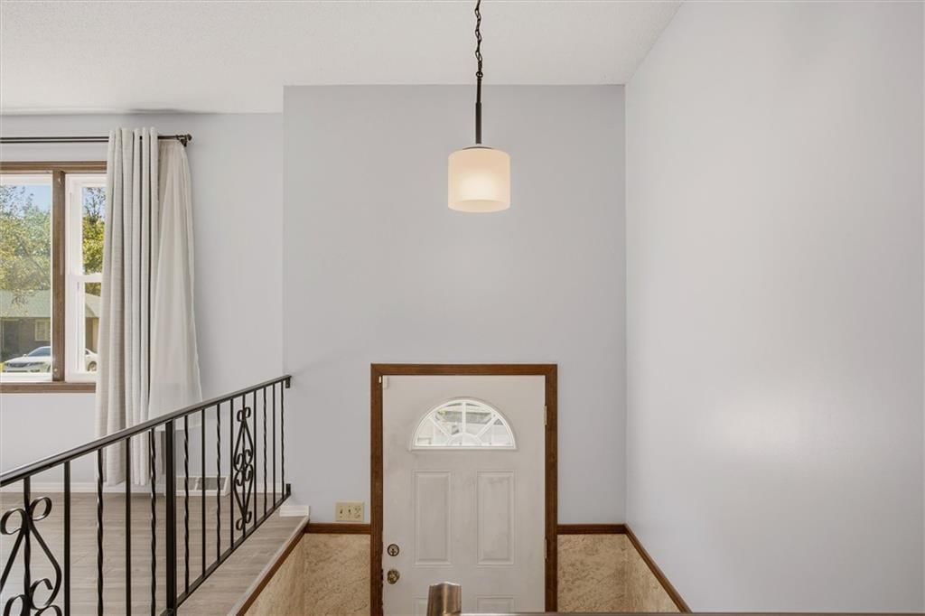 Staircase and white trim at 5538 Webster Avenue, Kansas City, KS 66104