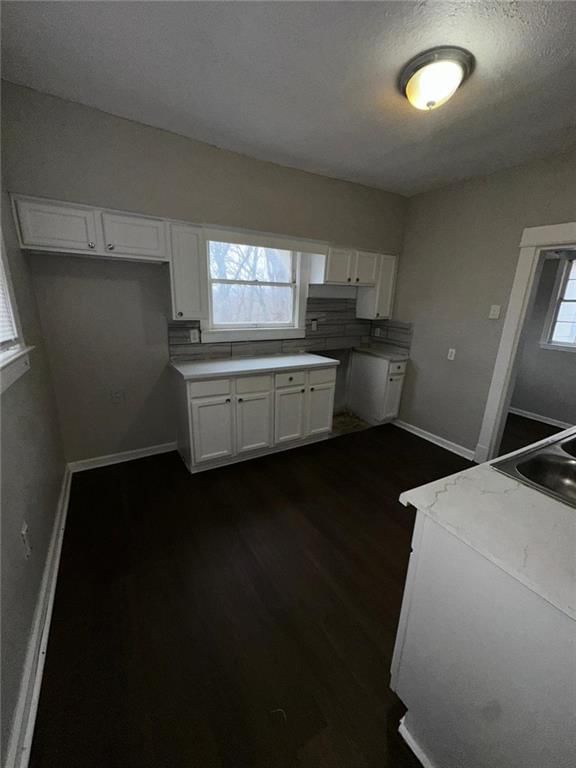 White kitchen and kitchen backsplash at 4208 Wabash Avenue, Kansas City, MO 64130