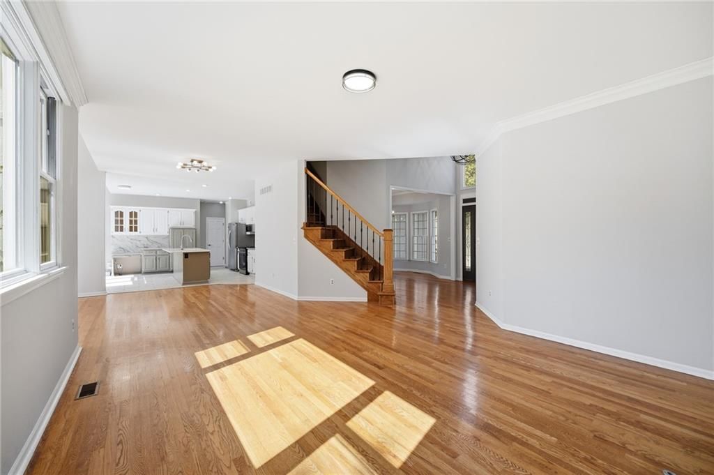 Open floor plan and statement lighting at 9409 W 131st Street, Overland Park, KS 66213