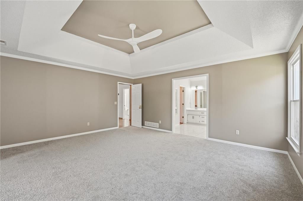 Walk-in shower, tiled shower and double vanity at 9409 W 131st Street, Overland Park, KS 66213
